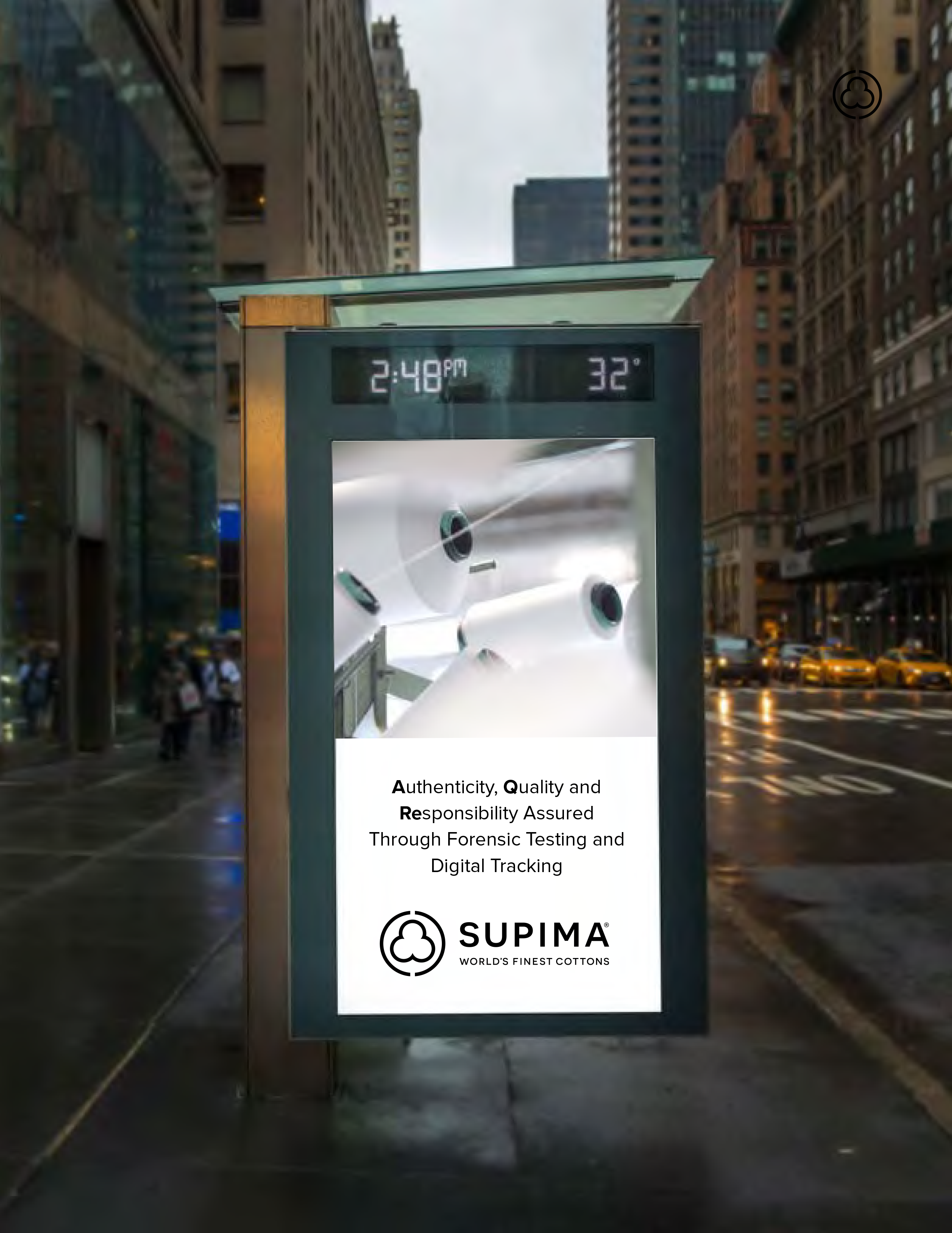 Digital display on a city street with Supima branding and text about authenticity and quality assurance.